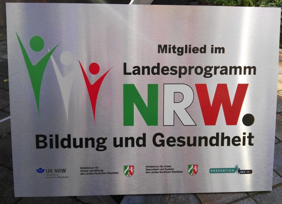 Foto des Hausschildes: Mitglied im Landesprogramm NRW Bildung und Gesundheit